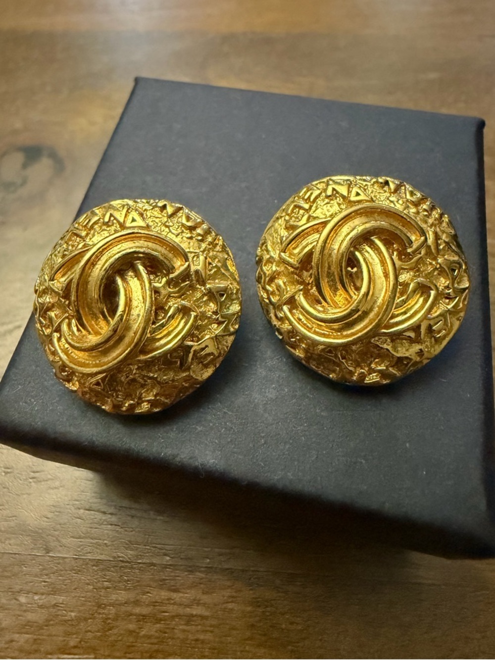CHANEL Gold-Tone Sculpted CC Button Earrings